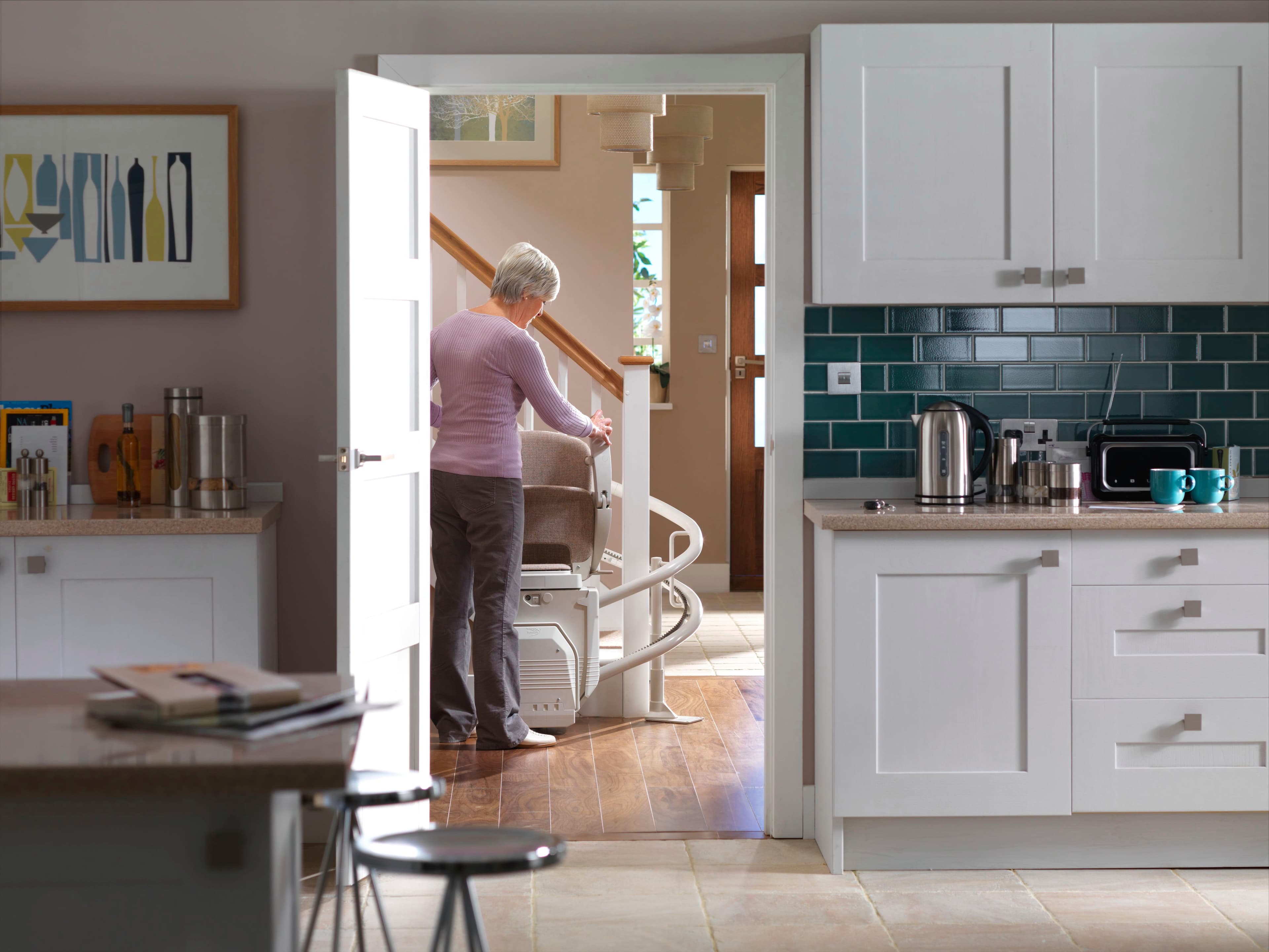 Curved stairlift seen from kitchen