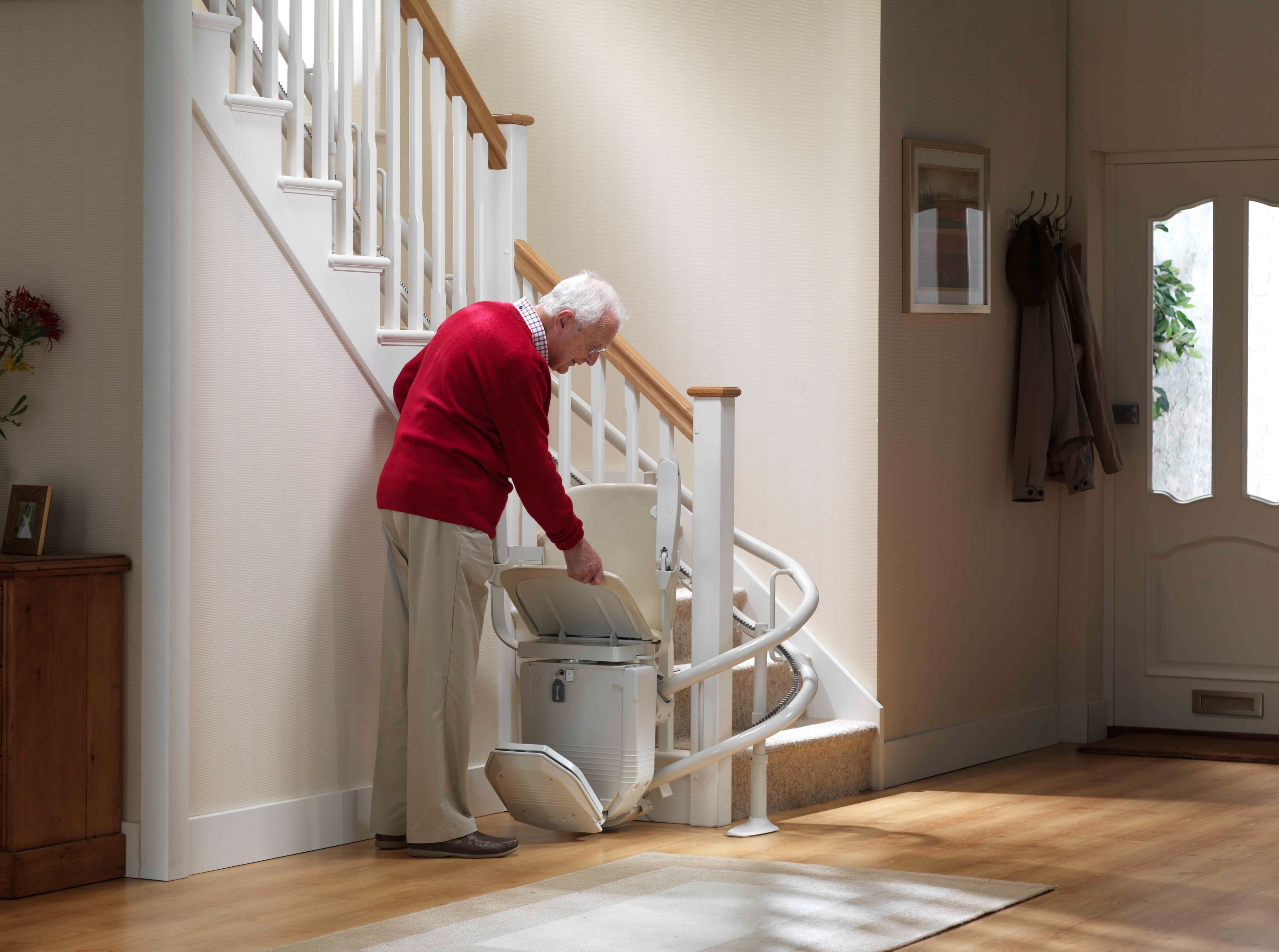 Technician measuring a curved staircase